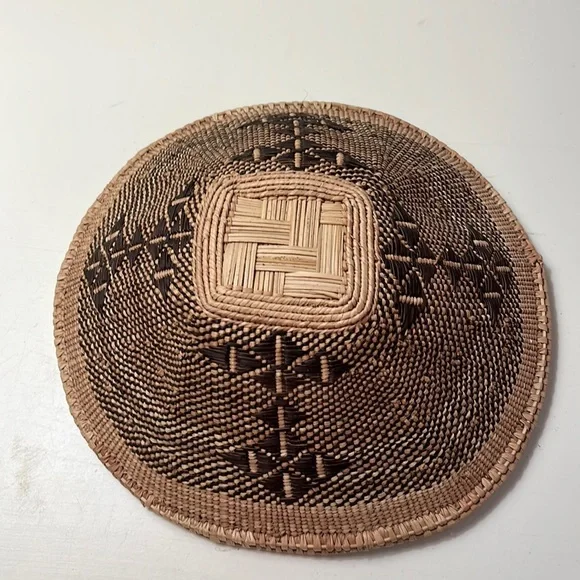 Small round woven basket. Tan and brown. - Picture 1 of 3